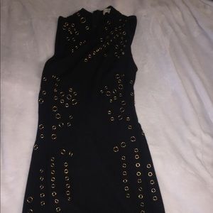 Black dress with gold circles